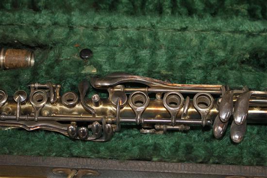 A Gladiator silver plated clarinet, cased